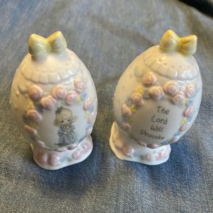 Precious Moments egg shaped salt and pepper shakers.